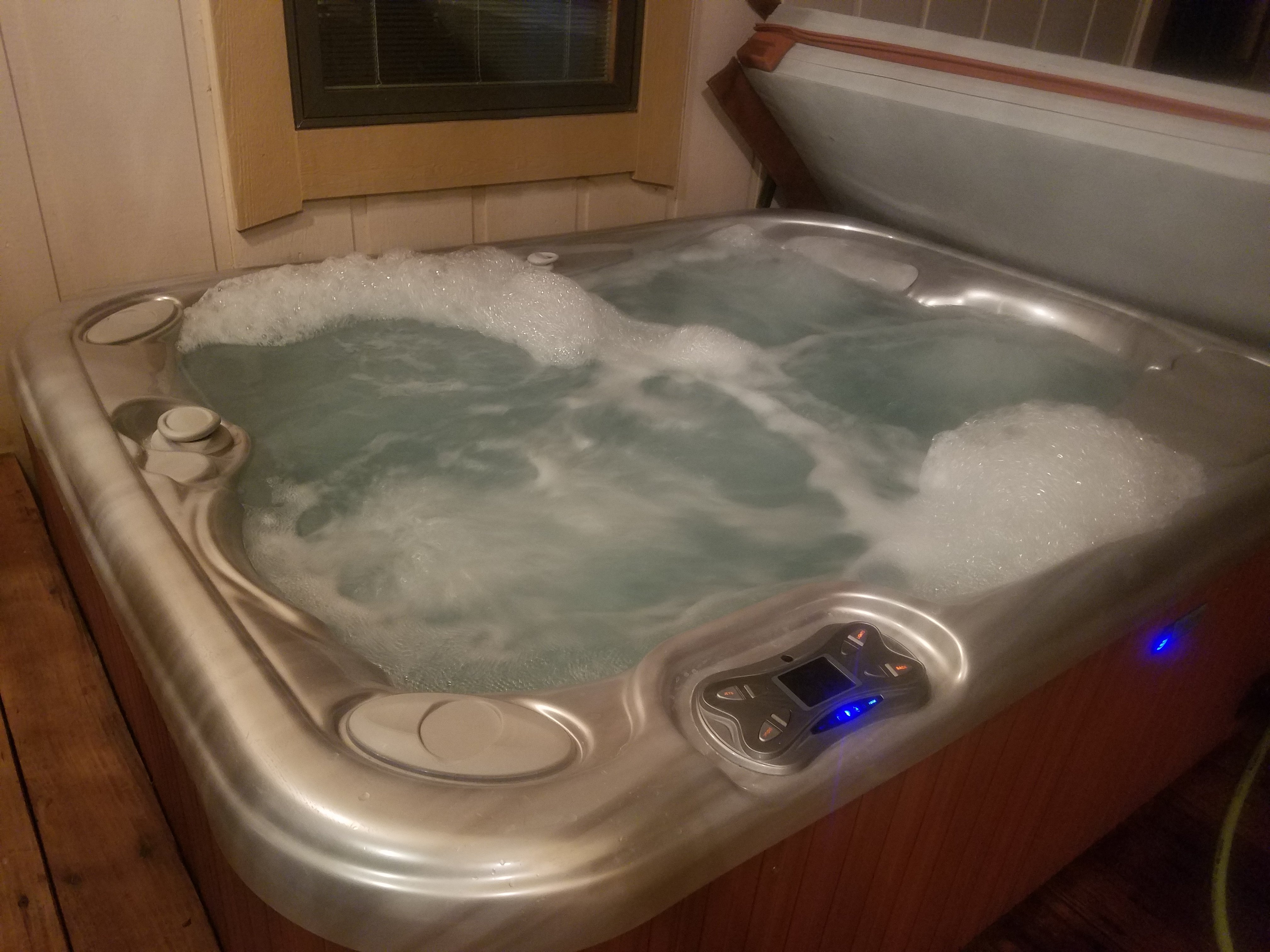 Bubbling in hot tub after draining and refilling normal? Portable