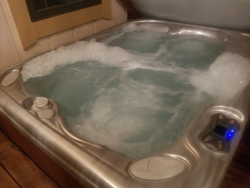 Bubbling in hot tub after draining and refilling normal? Portable