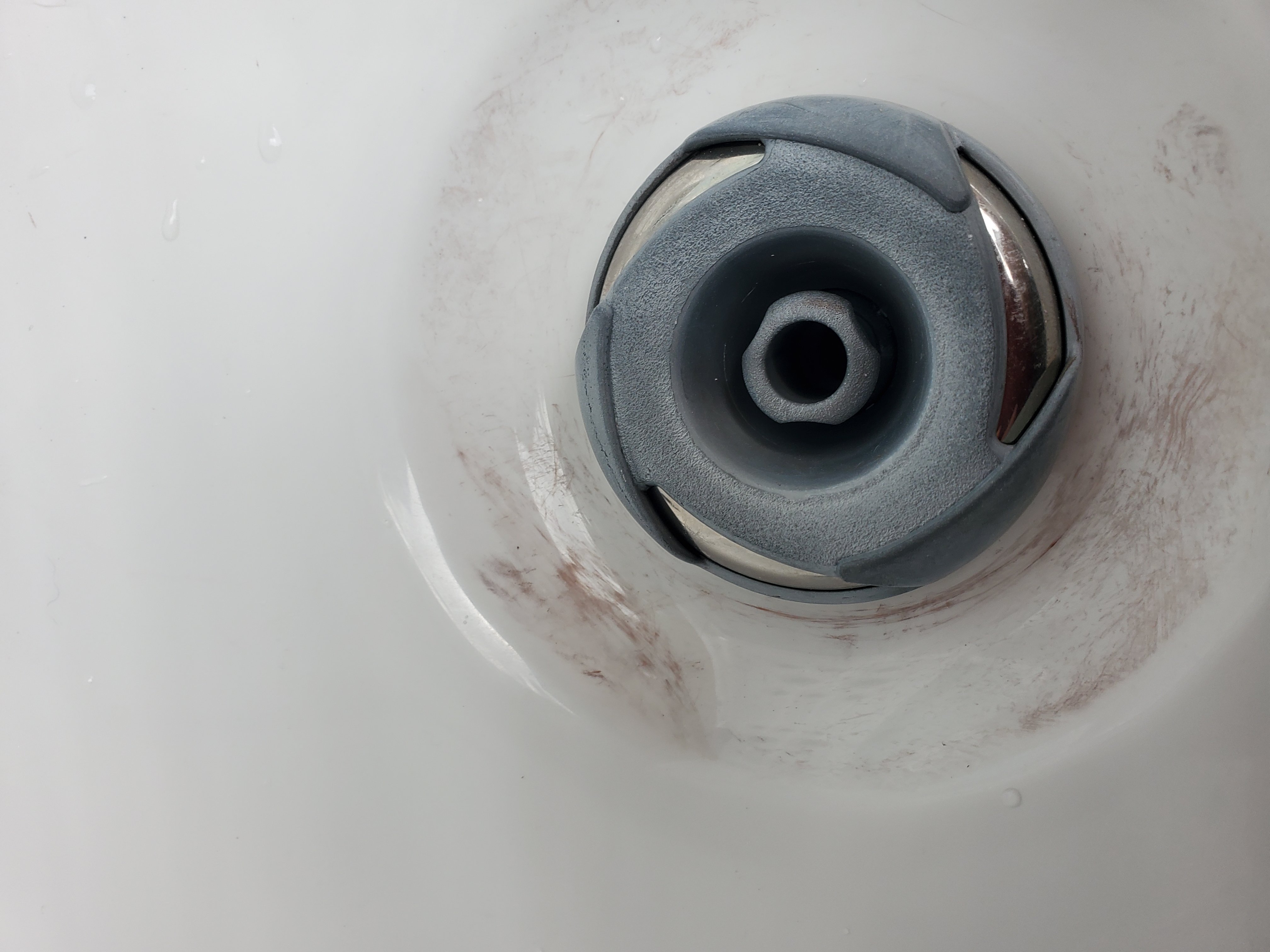 Stains or growth in hot tub. What is this? Hot Tub Water Chemistry